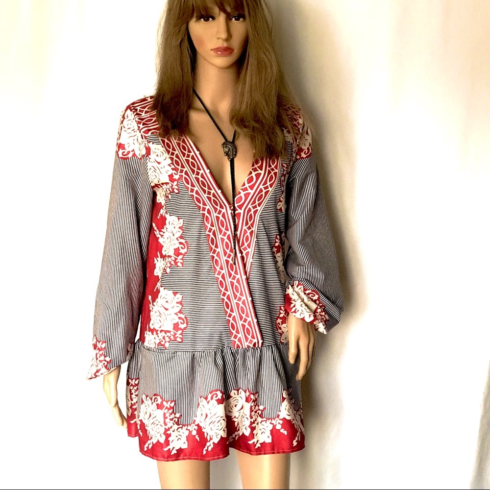 Unusual dress with dropped waist and oriental design